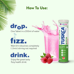 A Tuskca Biotin tablet dissolving in a glass of water.