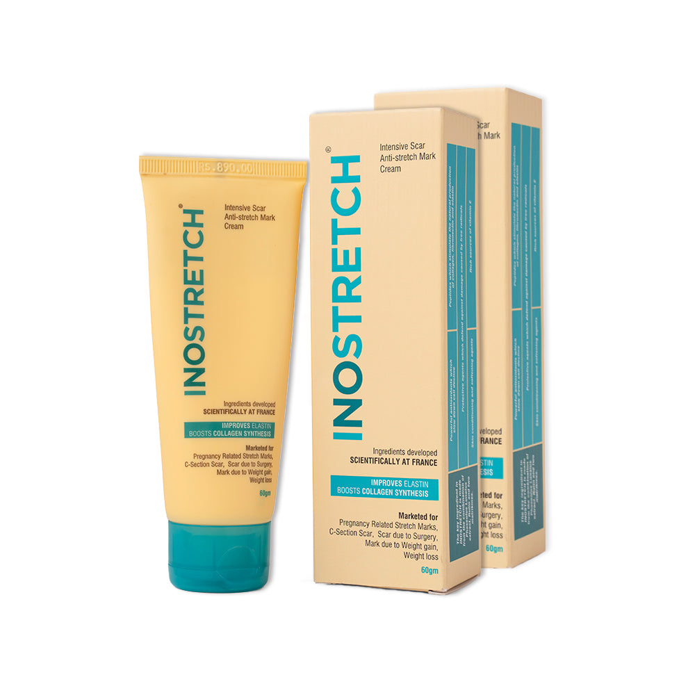 Two package and tubes of Inostretch Intensive Scar & Stretch Mark Removal Cream with white background.